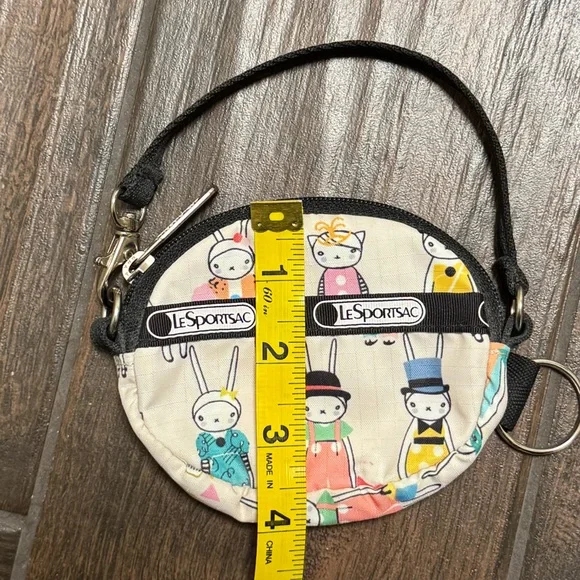 LeSportsac Round Wristlet Pouch in Cream with Multicolor Bunny Picnic Print - Picture 10 of 10